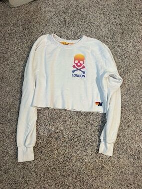 White Cropped Sweatshirt with Gradient Skull Graphic